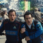 Violet (Michelle Monaghan), Sam Brenner (Adam Sandler), Ludlow (Josh Gad) and Q*bert in Columbia Pictures' PIXELS