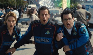 Violet (Michelle Monaghan), Sam Brenner (Adam Sandler), Ludlow (Josh Gad) and Q*bert in Columbia Pictures' PIXELS